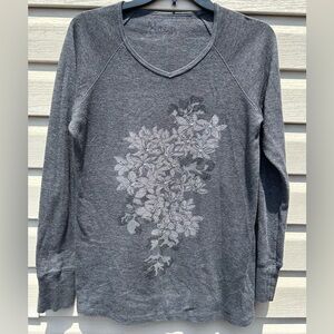 Women’s “Jake’s” long sleeved shirt. Gray with floral design. Size XL.